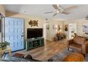 Spacious living room featuring modern furnishings, entertainment center, and stylish decor at 13807 N Garden Court Dr, Sun City, AZ 85351