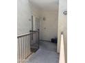 Apartment entrance with security door, and exterior lighting fixtures at 7101 W Beardsley Rd # 422, Glendale, AZ 85308