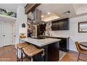 Modern kitchen featuring stainless steel appliances, a stylish island, and elegant white countertops at 7557 N Dreamy Draw Dr # 139, Phoenix, AZ 85020