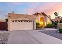 Inviting single-Gathering home features a well-manicured yard and charming desert landscaping at 11085 E Mary Katherine Dr, Scottsdale, AZ 85259