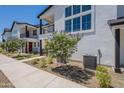 Contemporary home featuring an exterior design with decorative trees and plants at 11300 N Casa Dega Dr # 1005, Surprise, AZ 85388