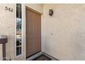 Charming entrance featuring a beige door and clean exterior at 7101 W Beardsley Rd # 542, Glendale, AZ 85308