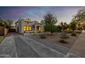 Charming home with manicured lawn and long driveway at 725 W Portland St, Phoenix, AZ 85007