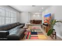 Bright living room features wood floors, modern furnishings, and an open layout at 7533 N 8Th St, Phoenix, AZ 85020