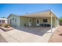 Wide carport with kayak and welcome sign, perfect for outdoor gear at 9822 E Main St # 4, Mesa, AZ 85207