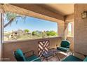 Relaxing patio with comfortable seating and views of the surrounding landscape at 29606 N Tatum Blvd # 245, Cave Creek, AZ 85331