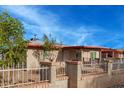 Inviting single-story home with a fenced yard, mature trees, and a well-maintained front exterior at 3622 W Sunland Ave, Phoenix, AZ 85041