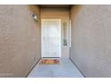 Inviting entryway with a decorative white door and a 'Give Thanks' welcome mat at 3649 E Hazeltine Way, Chandler, AZ 85249