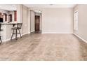 Open living area with tile flooring, perfect for entertaining and relaxation at 5541 W Desperado Way, Phoenix, AZ 85083