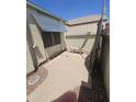 View of the private courtyard patio with a bench and space for outdoor enjoyment at 6036 W Mescal St, Glendale, AZ 85304