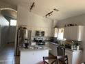 Bright eat-in kitchen with stainless steel appliances, granite countertops and ample cabinet space at 10006 N 7Th Pl, Phoenix, AZ 85020