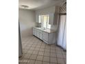 Functional kitchen area featuring ample counter space and updated appliances at 13603 N 111Th Ave, Sun City, AZ 85351