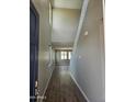 Spacious entryway features wood-look tile flooring and soaring ceilings at 3372 S 180Th Ln, Goodyear, AZ 85338