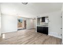 Bright and spacious living area with a sliding door and seamless transition to the modern kitchen at 4228 N 81St St, Scottsdale, AZ 85251