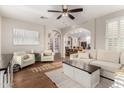Bright living room with hardwood floors, neutral palette, and comfortable seating at 1134 S Lydia Ln, Gilbert, AZ 85296