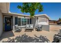 Charming patio featuring stylish outdoor furniture and a welcoming entryway at 1311 W Ellis St, Mesa, AZ 85201