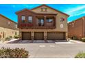 Inviting two-story townhome featuring a private balcony and three-car garage at 2250 E Deer Valley Rd # 26, Phoenix, AZ 85024