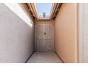 Stylish entryway featuring a custom metal security gate with desert-themed designs at 3755 E Hazeltine Way, Chandler, AZ 85249