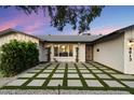 Charming entrance with stone and artificial grass flooring at 4613 S Rita Ln, Tempe, AZ 85282