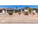 Charming single-story home featuring a low-maintenance yard and decorative accents over the brickwork at 554 N Sunset Dr, Chandler, AZ 85225