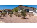 Well-maintained front yard featuring desert landscaping and charming curb appeal on a sunny day at 554 N Sunset Dr, Chandler, AZ 85225