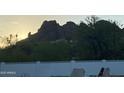 Relaxing backyard view featuring a privacy fence and scenic mountain views at 5625 N 45Th St, Phoenix, AZ 85018