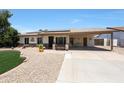 Cozy single-story home with front yard desert landscaping and covered carport at 730 W Curry St, Chandler, AZ 85225