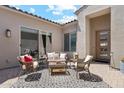 Charming outdoor patio with comfortable seating, perfect for relaxing or entertaining guests at 8396 E Granite Pass Rd, Scottsdale, AZ 85266