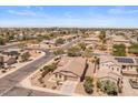 Expansive aerial view of a residential neighborhood, showcasing the layout and surrounding environment at 1415 N Frederick Ln, Casa Grande, AZ 85122