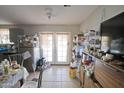 Spacious kitchen with tiled flooring, a refrigerator, and plenty of storage space at 6101 N 31St Dr, Phoenix, AZ 85017