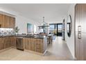Bright kitchen with modern appliances, dark countertops, and lots of natural light at 7180 E Kierland Blvd # 811, Scottsdale, AZ 85254