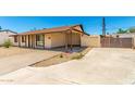 Charming single-story home with covered carport and fenced yard at 7360 N 38Th Dr, Phoenix, AZ 85051