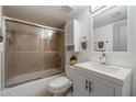 Updated bathroom featuring a shower with glass doors, modern vanity, and stylish fixtures at 7430 E Chaparral Rd # A222, Scottsdale, AZ 85250