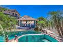 Inviting pool with lush landscaping, complete with an outdoor bar area, perfect for entertaining at 838 E Nolan Pl, Chandler, AZ 85249