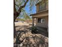 Home exterior with desert landscaping and a covered front porch at 40504 N Las Praderas St, San Tan Valley, AZ 85140