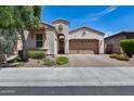 Charming single-story home featuring a paved driveway, an attached two-car garage, and manicured landscaping at 4630 E Navigator Ln, Phoenix, AZ 85050