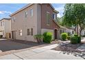 Two-story home with a two-car garage and low-maintenance landscaping at 4743 E Laurel Ave, Gilbert, AZ 85234