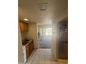 View from kitchen shows cabinetry, appliances, and connection to spacious living area at 4750 N Central Ave # 3S, Phoenix, AZ 85012