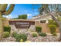 Coventry at Grayhawk community entrance sign surrounded by desert landscaping under a bright blue sky at 7527 E Nestling Way, Scottsdale, AZ 85255