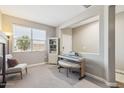Bright living room area with a window offering natural light and comfortable seating at 1281 W Highland Rd, San Tan Valley, AZ 85143