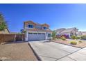 Charming home with a well-maintained exterior, desert landscaping, and an attached two-car garage at 1937 W Burgess Ln, Phoenix, AZ 85041