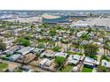 Expansive aerial view of a vibrant community showcasing diverse homes, lush trees, and proximity to city amenities at 2041 N 16Th Ave, Phoenix, AZ 85007