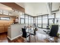 Open concept living and dining area has floor-to-ceiling windows offering breathtaking city views at 310 S 4Th St # 1601, Phoenix, AZ 85004
