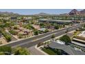 Street view of the home, showing the exterior and surrounding neighborhood at 3812 E Camelback Rd, Phoenix, AZ 85018