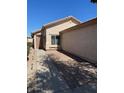 Inviting single-story home with a cozy entrance and landscaped front yard at 40047 N Cassara Dr, San Tan Valley, AZ 85140