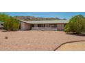 Single story ranch home featuring a desert landscape and mountain views at 405 E Thunderbird Trl, Phoenix, AZ 85042