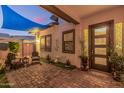 Welcoming outdoor patio with stylish furniture and a shaded awning for relaxing at 5218 N Tiller Dr, Litchfield Park, AZ 85340