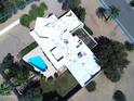 Property features a large flat roof with ample space to add additional outdoor features. Includes a pool at 5905 E Donna Ln, Paradise Valley, AZ 85253