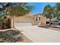Attractive single-Gathering home with a two-car garage, desert landscaping, and a classic terracotta tile roof at 11256 E Sunnyside Dr, Scottsdale, AZ 85259