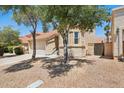 Welcoming single-Gathering home displaying a tile roof and desert landscaping, complemented by mature trees at 11256 E Sunnyside Dr, Scottsdale, AZ 85259